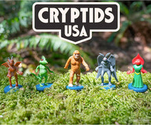 Laden Sie das Bild in den Galerie-Viewer, Cryptids USA Toy Figures set Monopoly Archie McPhee Corral of Cryptids Gag Gift – USA Monster Set w/Bigfoot, Mothman &amp; More – Funny Stocking Stuffer for Cryptid Lovers &amp; Fans of American Folklore Chupacabra
